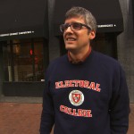Mo Rocca wearing Electoral College sweatshirt